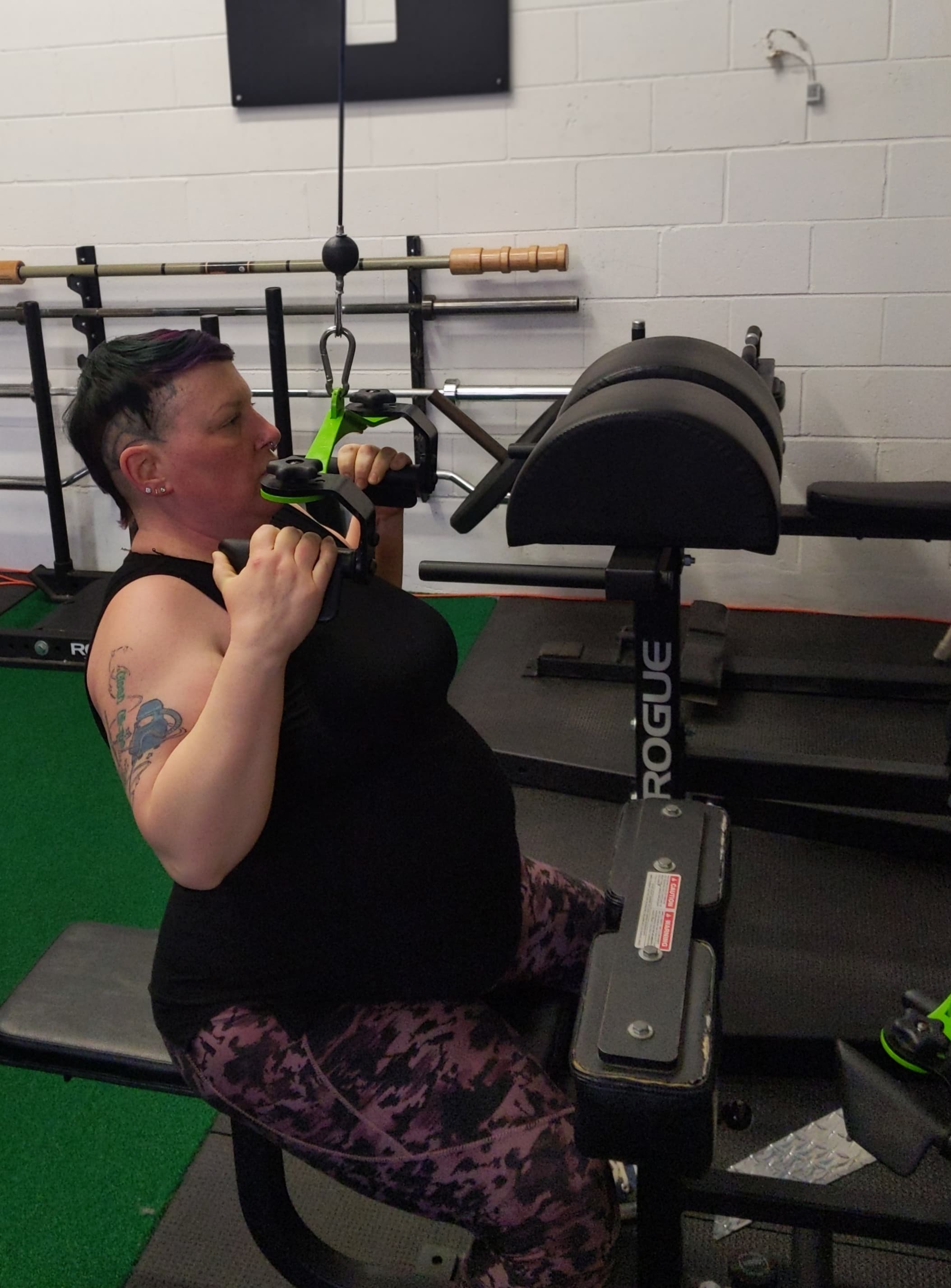 Client performing a seated cable row at Carpio Strength & Conditioning