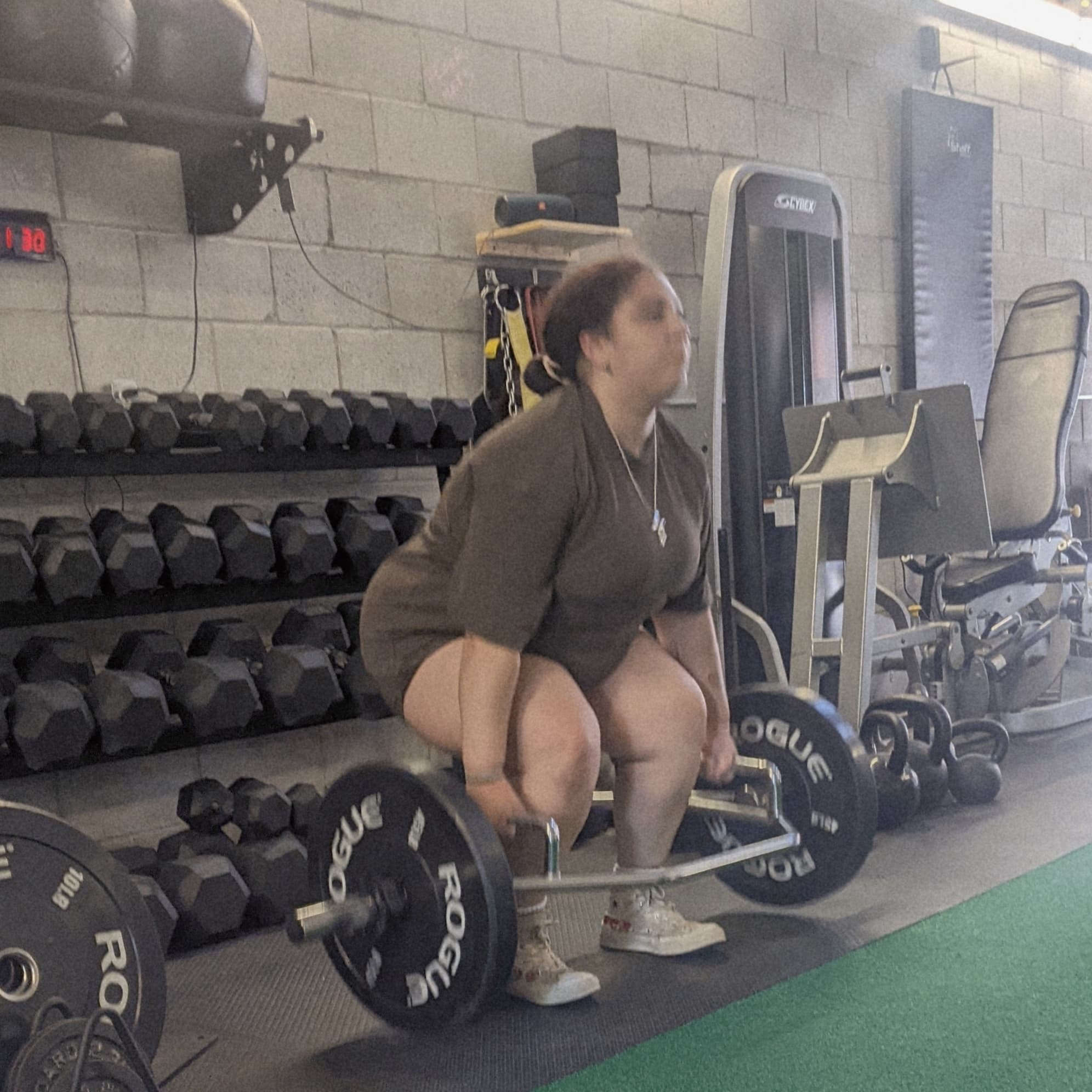 Client performing a trap bar deadlift at Carpio Strength & Conditioning